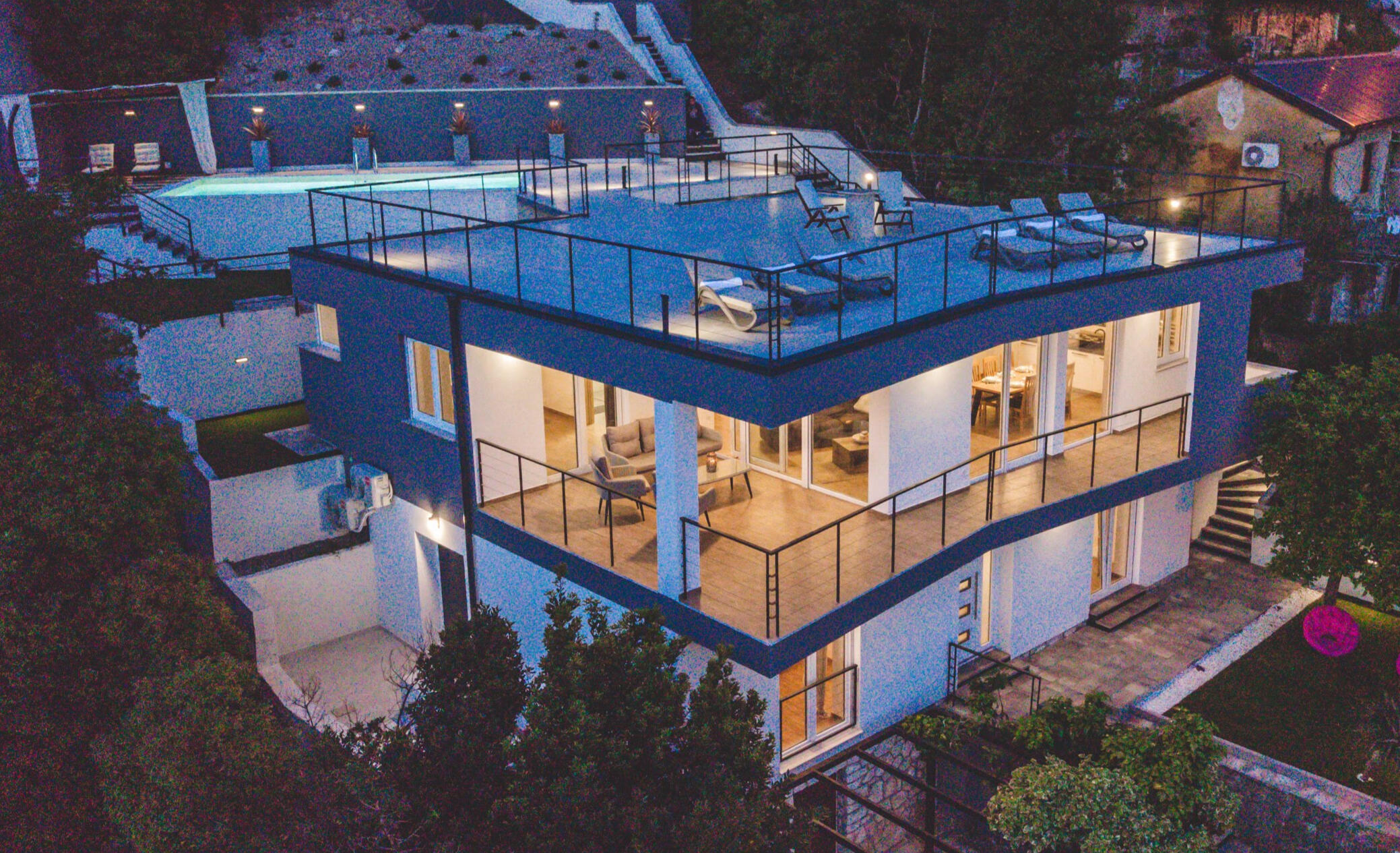 Birds eye view on pool and roof terrace